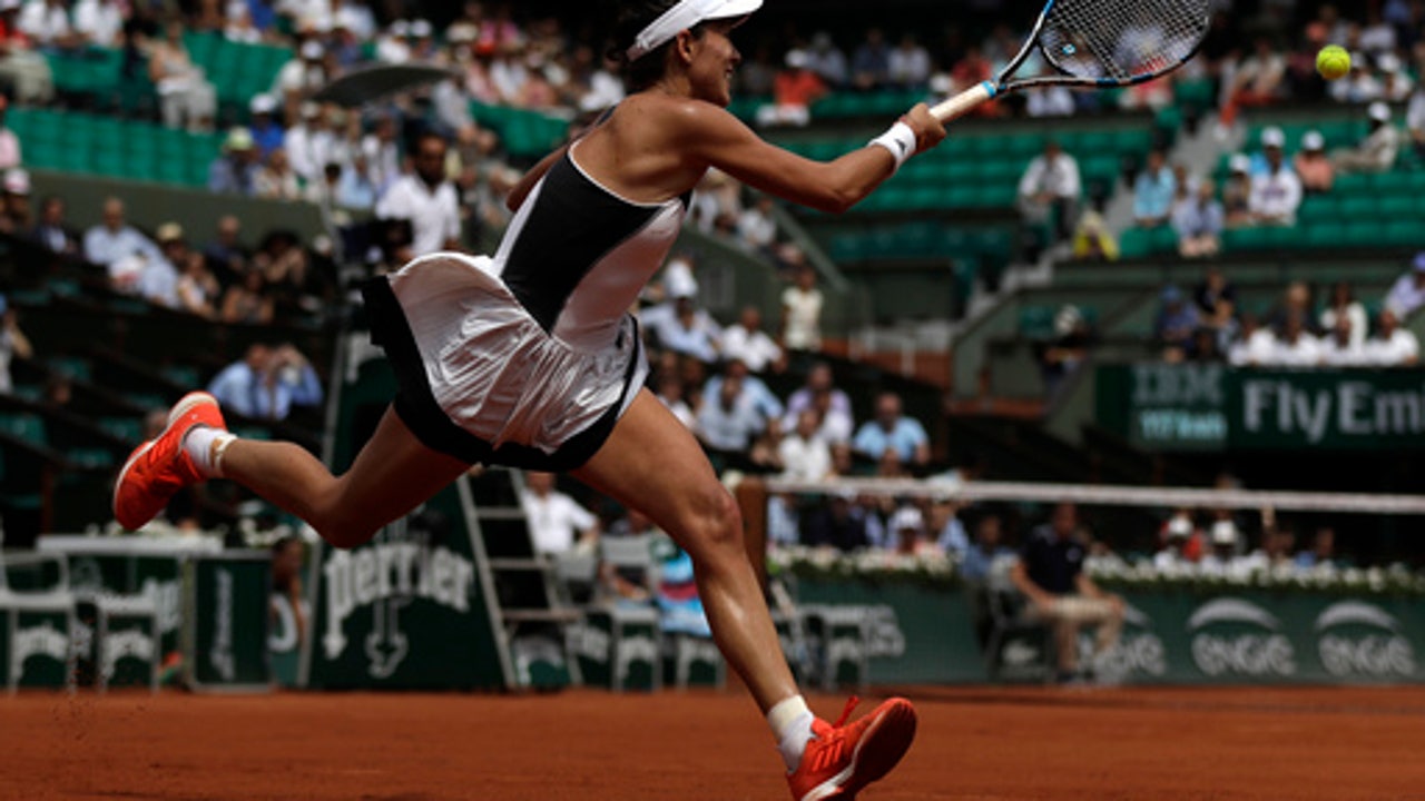 The Latest: Defending champion Djokovic into quarterfinals